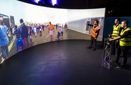Students using the interactive screen in the simulation centre