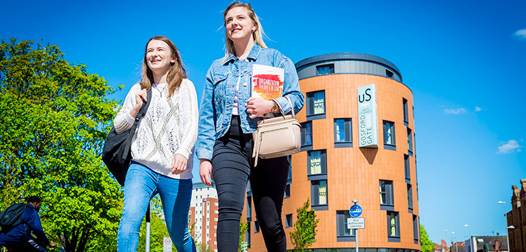 Students walking outside Gosford Gate student accommodation