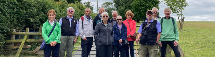 Members of the Lanchester Association out on a walk in the countryside.