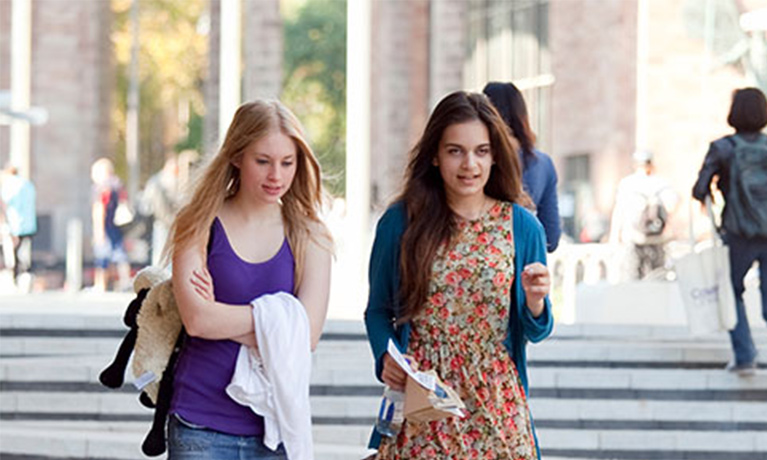 Students walking outside the Hub