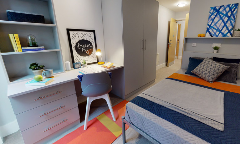 A Bronze ensuite bedroom at Magenta House, with modern colourful decor.