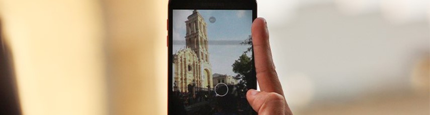 phone on camera showing a cathedral