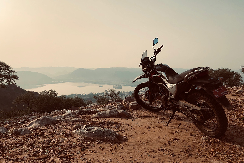 Motorbike on hill with a view