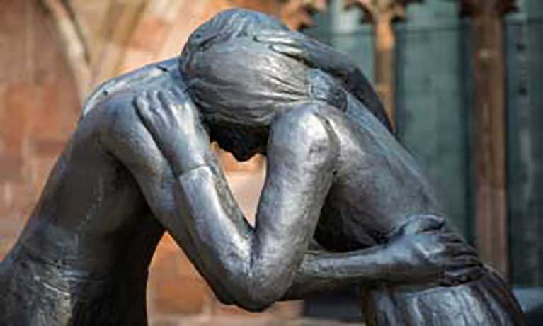 Statue of reconciliation in the old cathedral