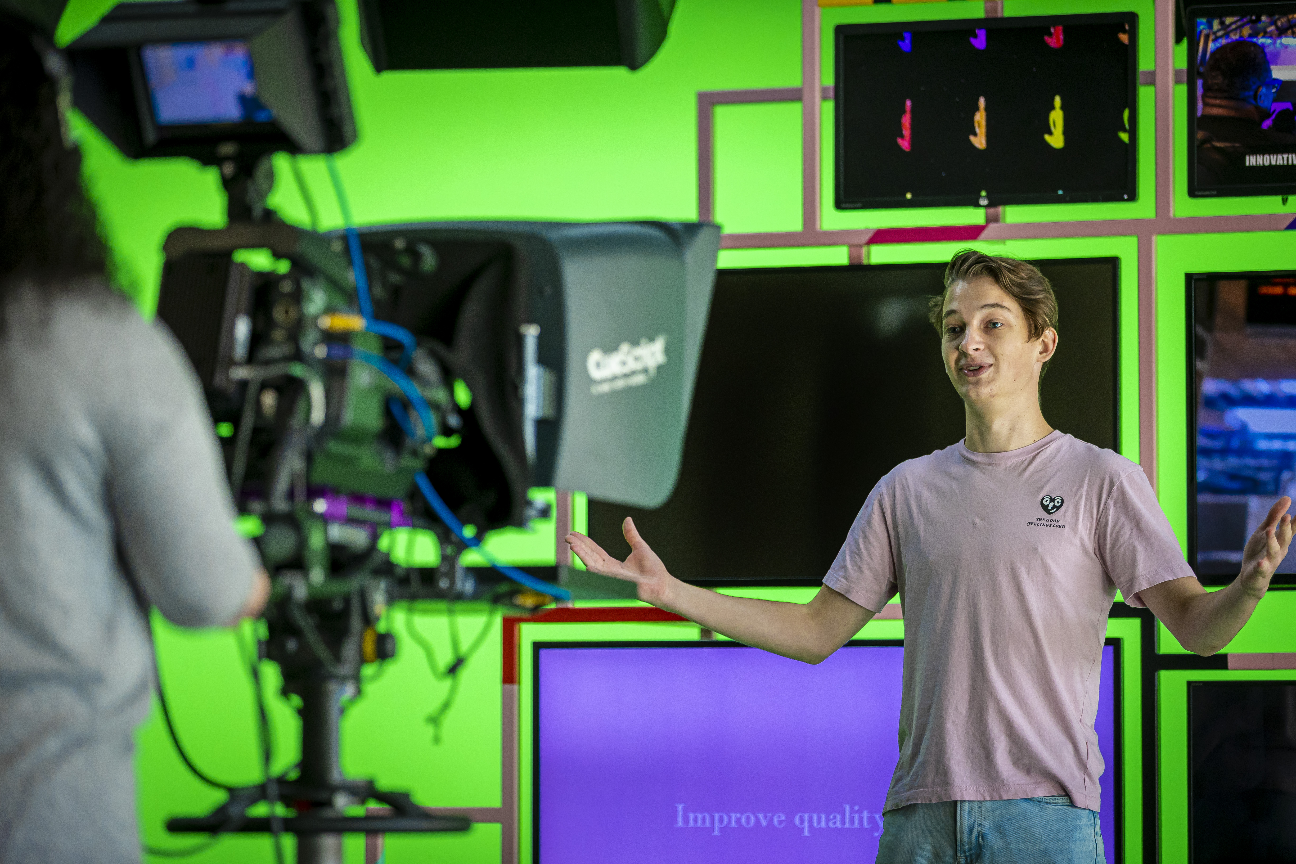 a student in a Coventry University studio a student in front of a camera at Coventry University studio