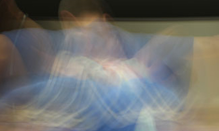Man distorted by blurry camera