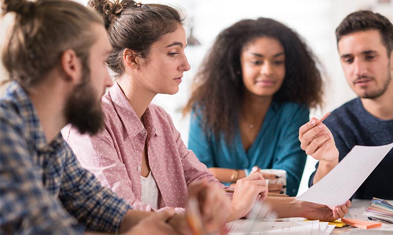 Researchers having a group discussion.