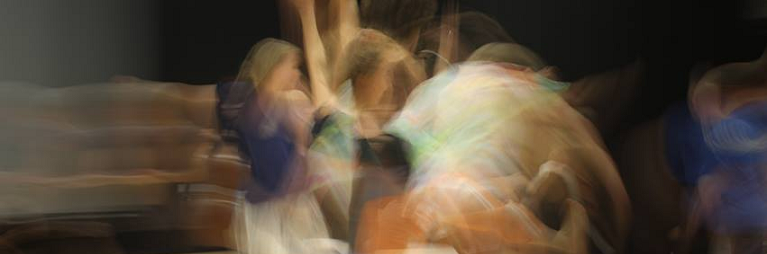 swirling image of dancers