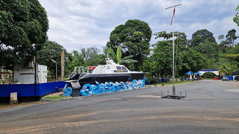 Picture of a Police boat docked on land