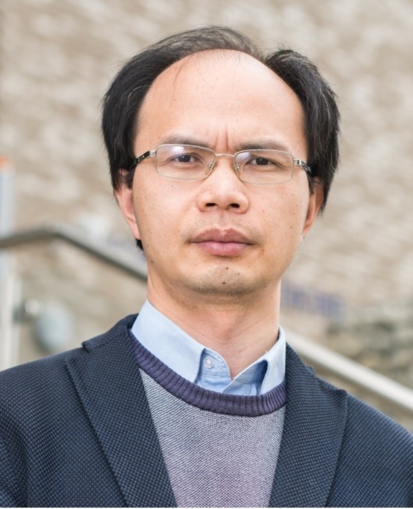 Head shot portrait of Dingchang Zheng