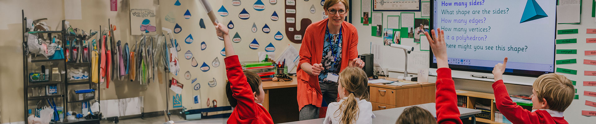 A female teacher in a primary classroom