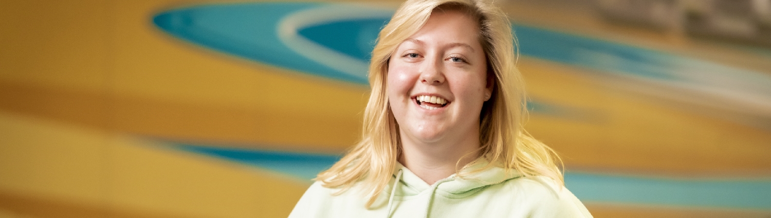 Female student smiling happily