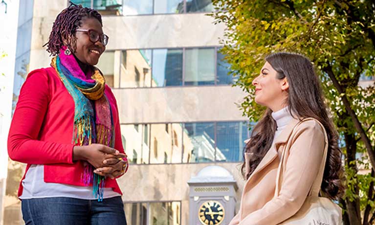 two young females chatting 