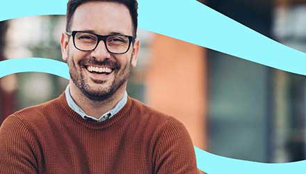 Smiling professional man wearing glasses 