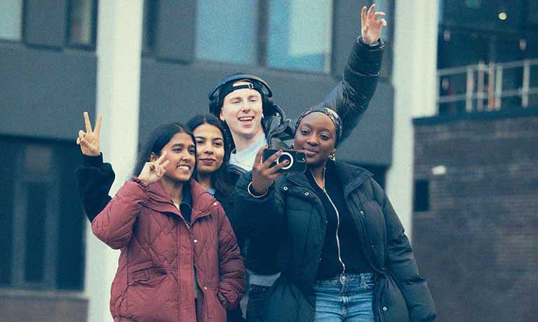 Students standing outside the Delia Derbyshire building