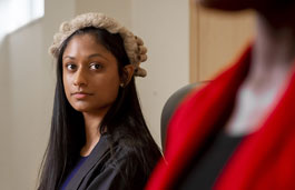 Female law student in a mock court