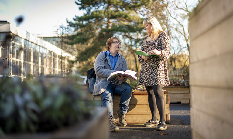Two students talking outside