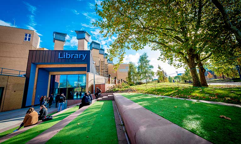 outside entrance of the library on pretty sunny day 