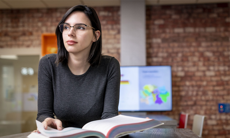 Student sat in the digicomm lab