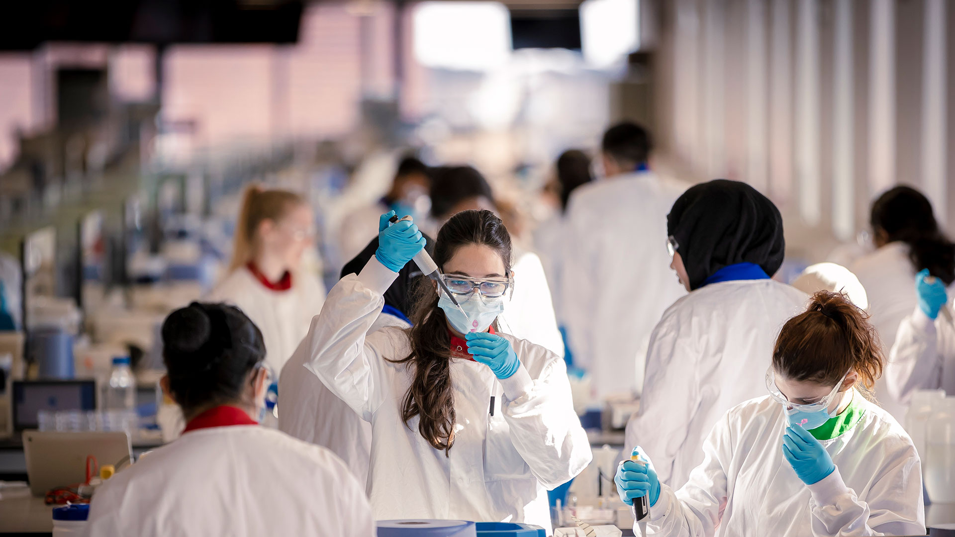 Students using science equipment