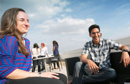 Students chatting in the Hub's rooftop garden