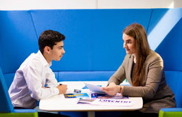 two students working together in a study space