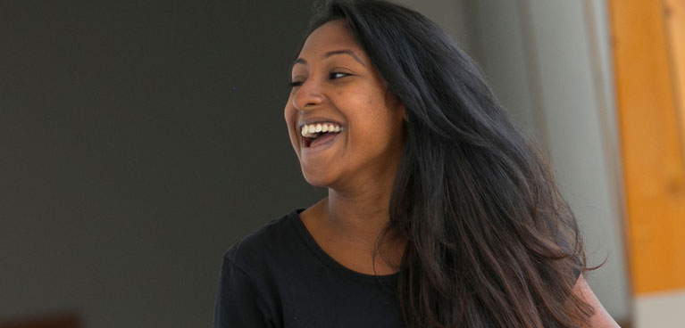 International and EU Scholarships International student laughing.