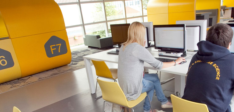 Students working in The Hub.