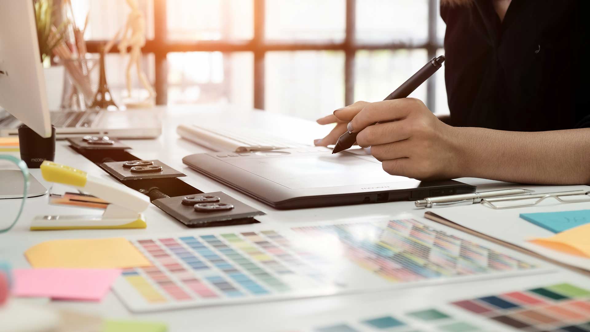 Close up of a printing press with paint smudges on a drum 