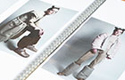 A students fashion photography book open with a ring binder