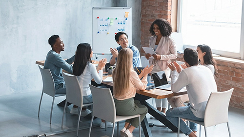 Team talking round a table