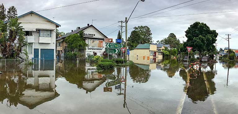 Flooded road with houses