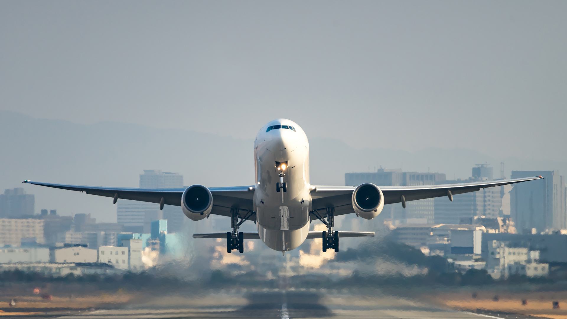 Plane taking off on runway