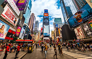 View from the busy square of the buildings in Times Square New York 