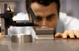 Close up of student using metrology tools