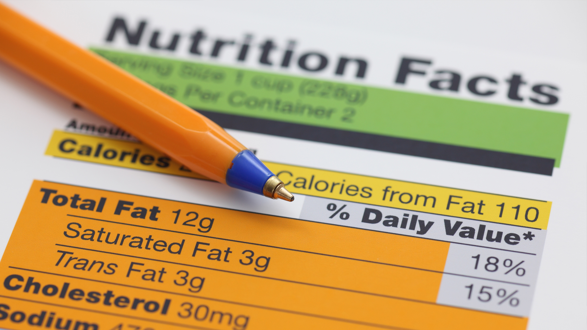 Close up of nutrition factsheet and pen