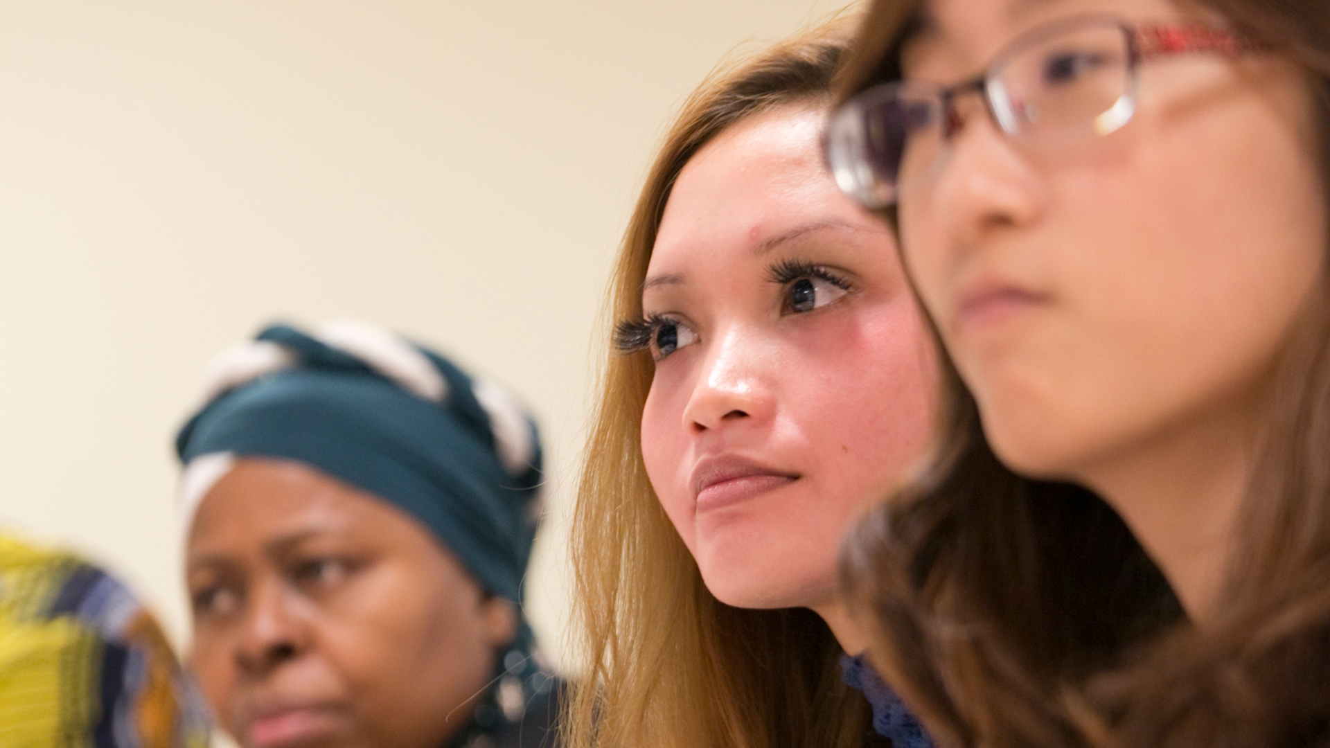 Close up image of three ladies