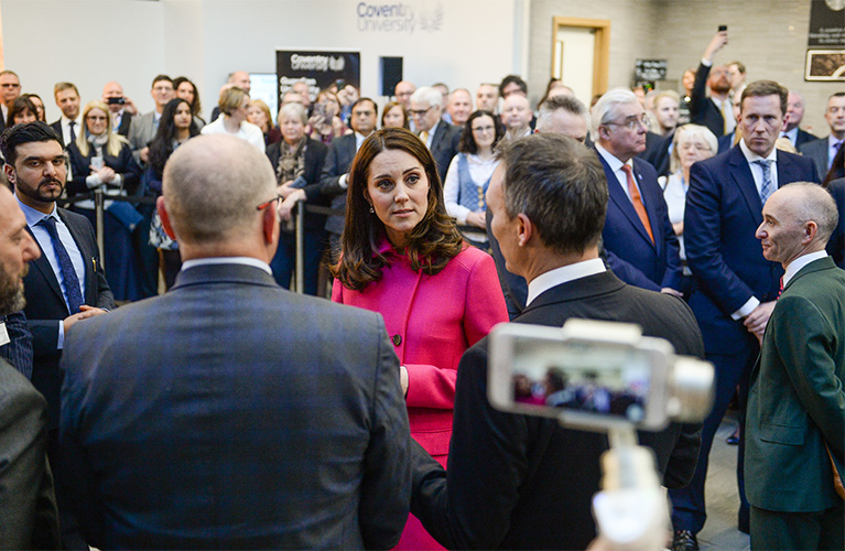 The Duchess of Cambridge talking to Coventry University senior management at the offical opening of the Health and Life Sciences building