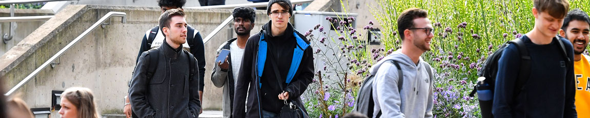 Students walking outside The Hub on campus.