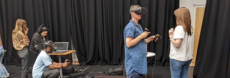 A group of people  using virtual reality headsets