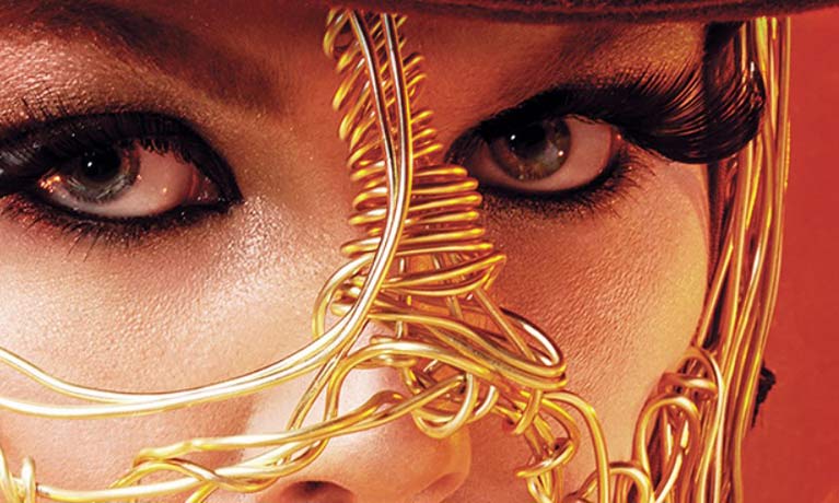close up of photo of girl with heavy make up and chains on their faces