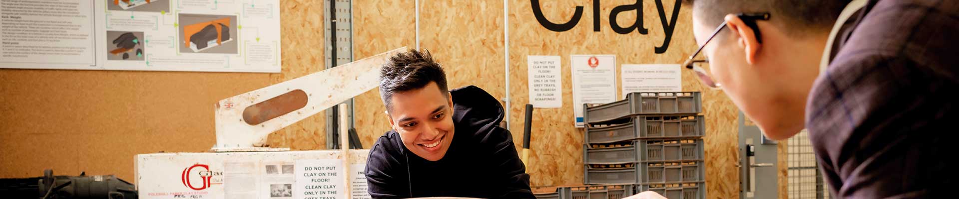 Students working on a clay model car