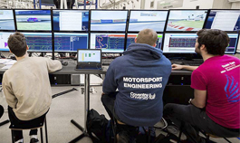 motorsport engineering students analysing data