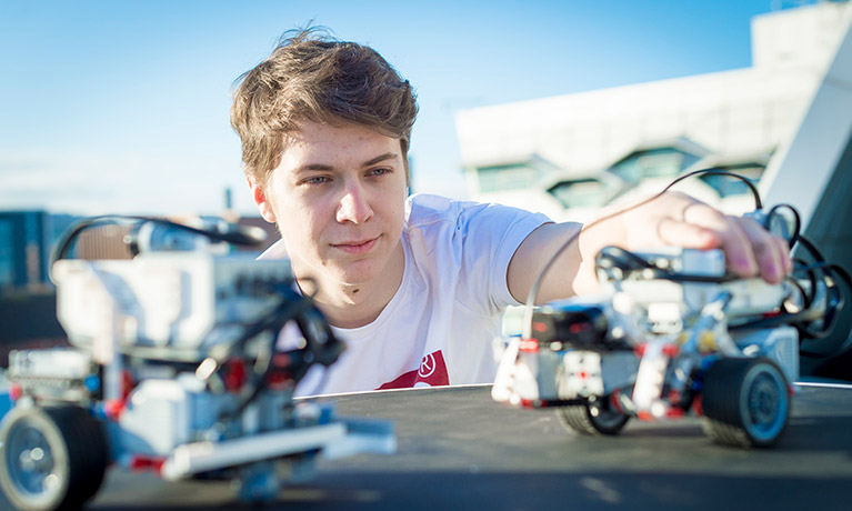 A student using electronics