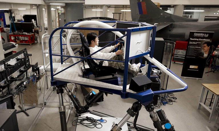 Student using the F1 simulator in an engineering lab