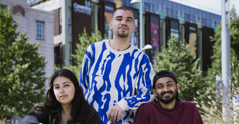 Students outside a Coventry University campus building.