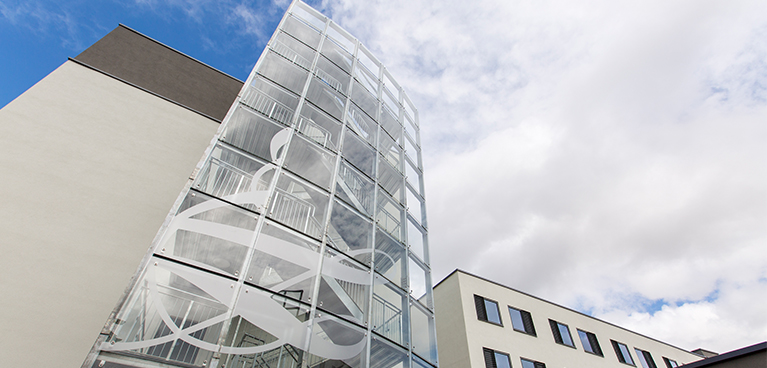 Upshot of building with glass windows