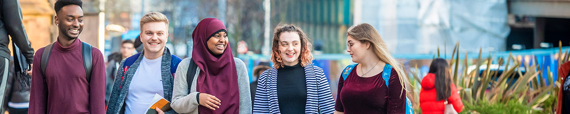 Postgraduate students walking in line in Coventry's city centre