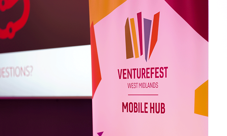 A pop-up banner with Venturefest branding