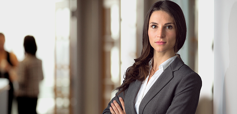 Woman dressed professionally looking face on